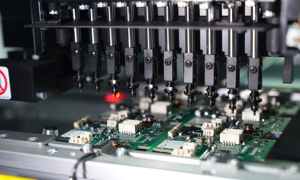 SMT placement nozzles assembling PCBs at EBest PCBA