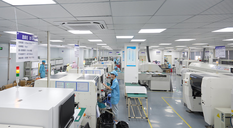 SMT production workshop with assembly equipment and operators