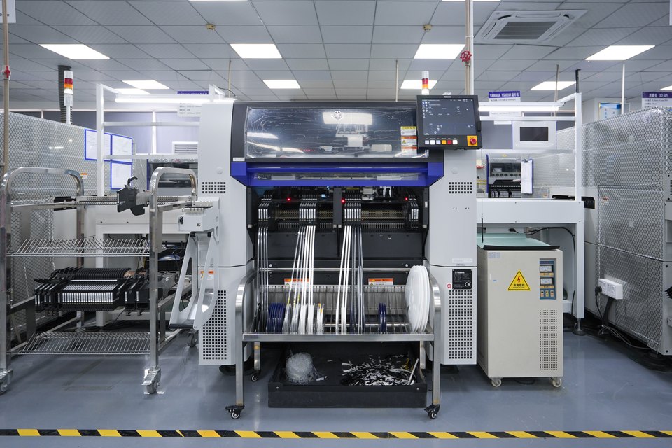 Yamaha surface mount pick-and-place equipment on a PCBA production line
