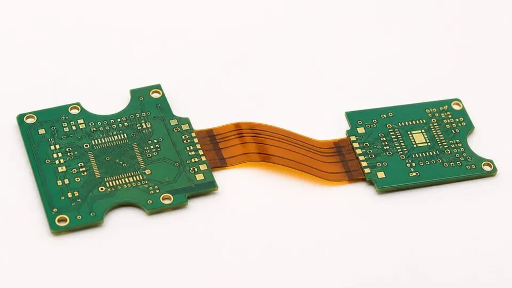 Representative rigid-flex PCB with two rigid mounting zones and a flexible interconnect