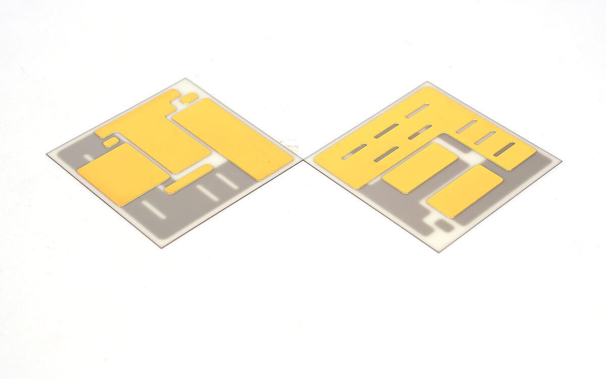 Photographed ceramic circuit substrates with gold-finished conductor features