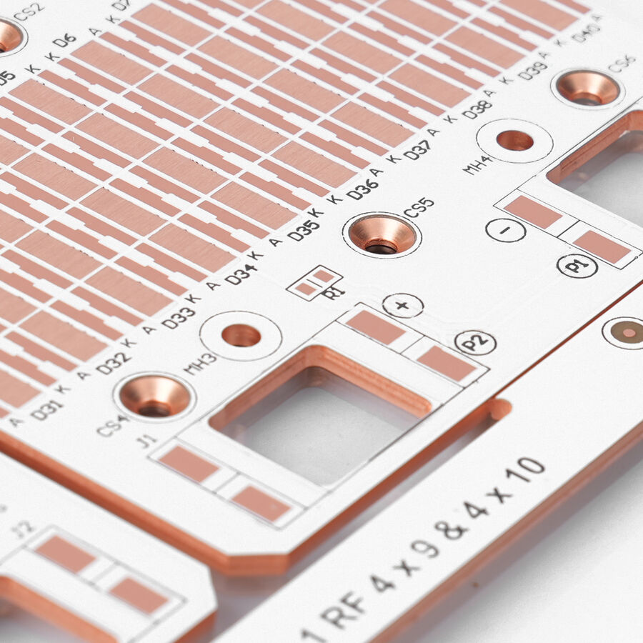 Metal core PCB with copper thermal pads and machined mounting features