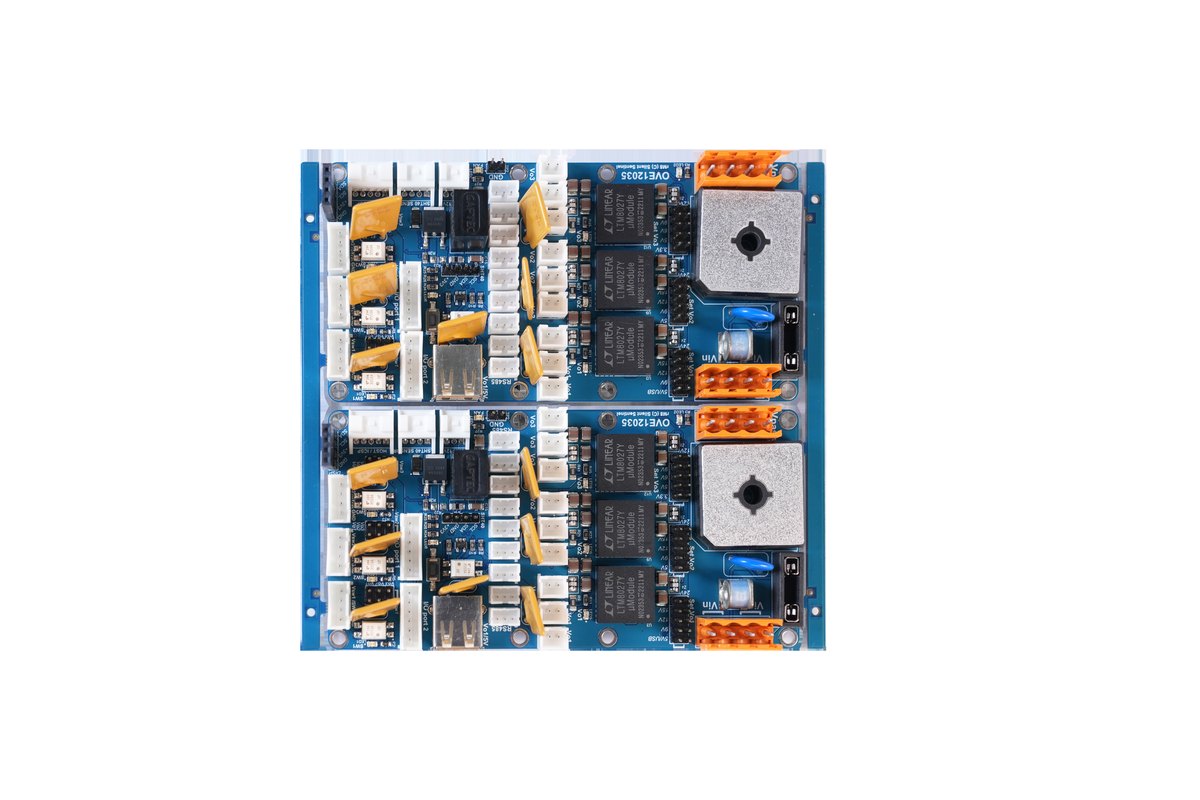 Representative high-density power and control PCBA on a white background